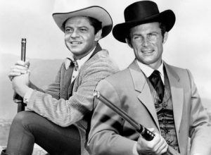 men holding gun